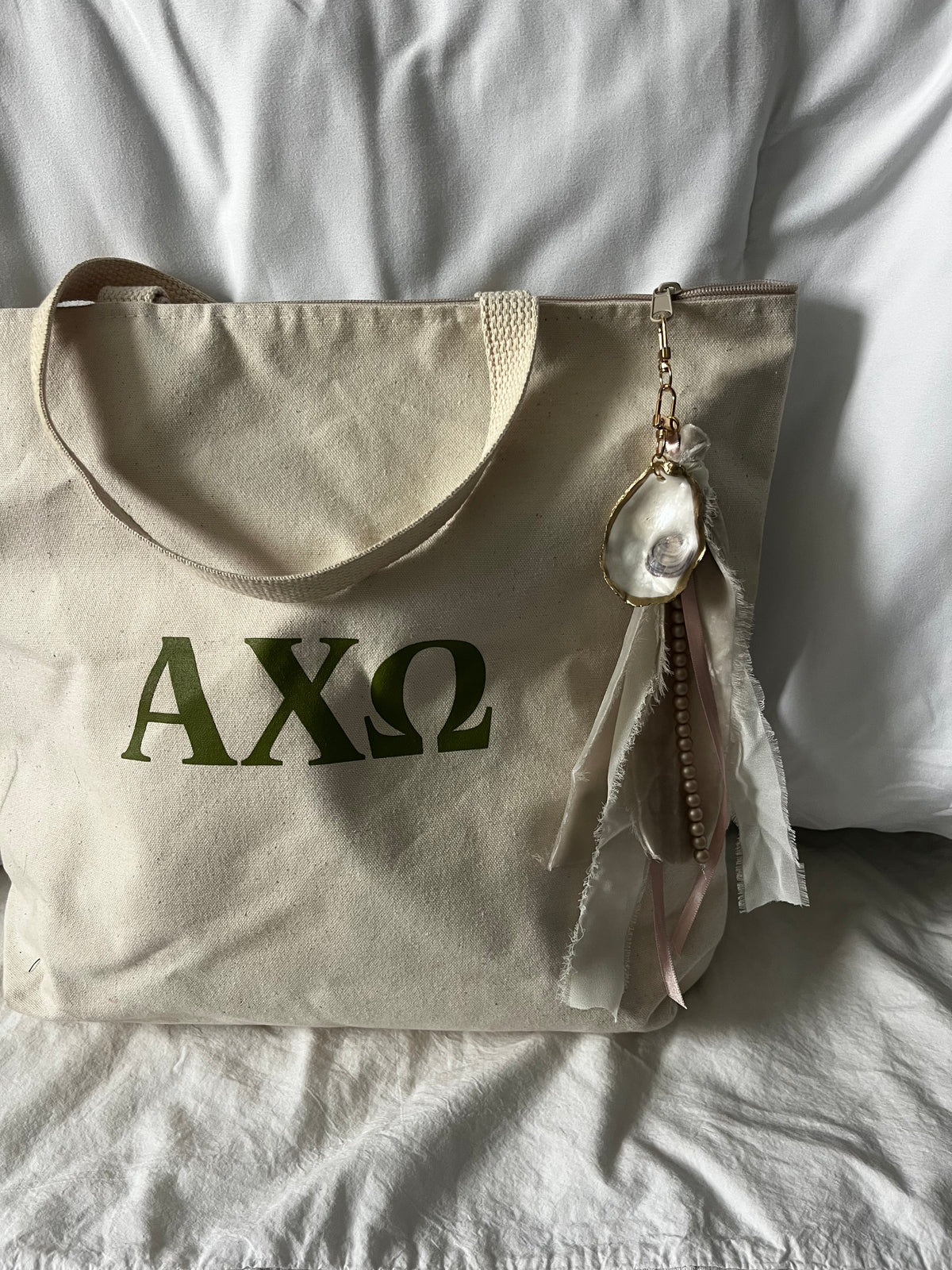 Soft and romantic velvet ribbon and pearls oyster shell bag charm