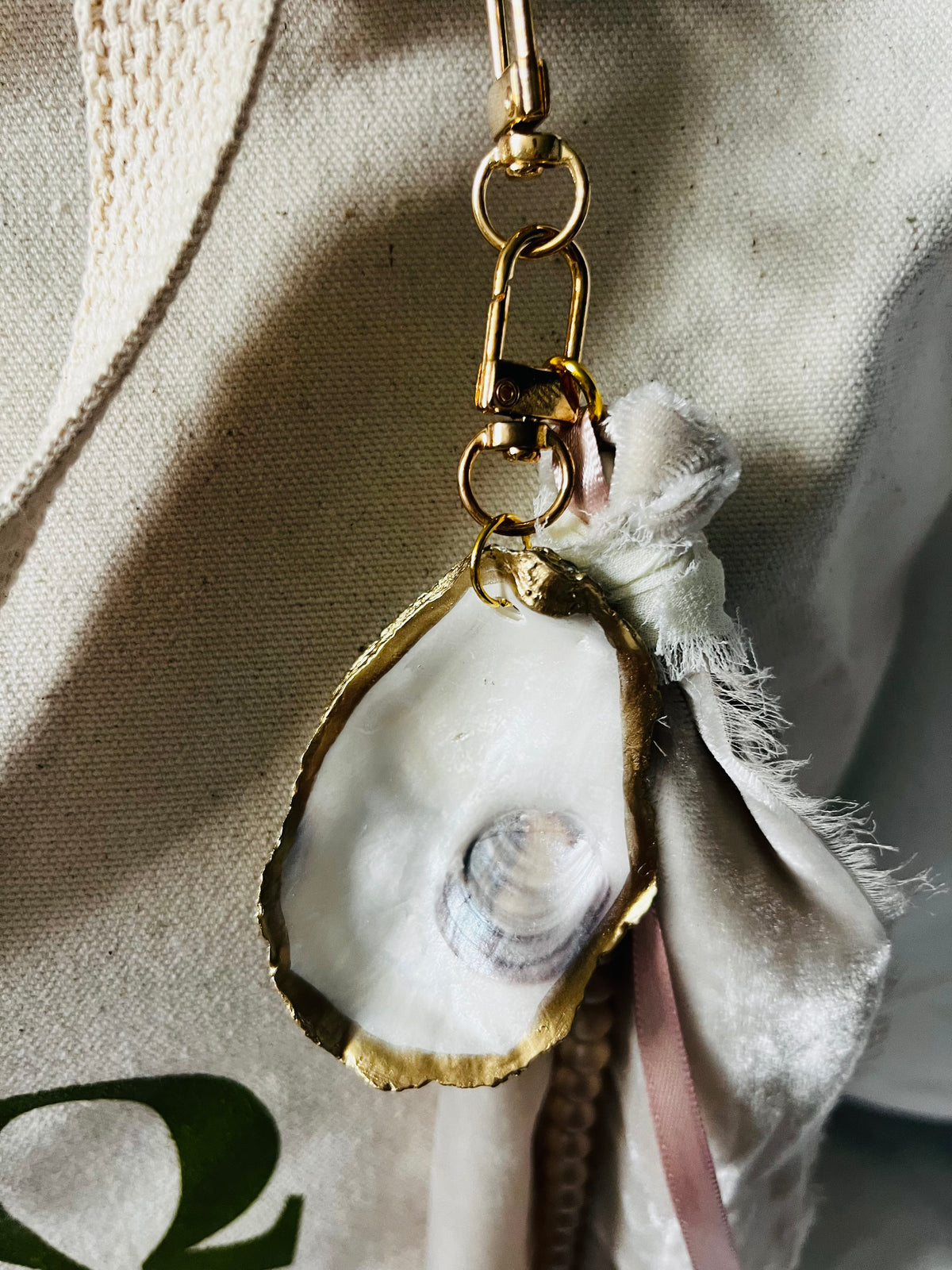 Soft and romantic velvet ribbon and pearls oyster shell bag charm