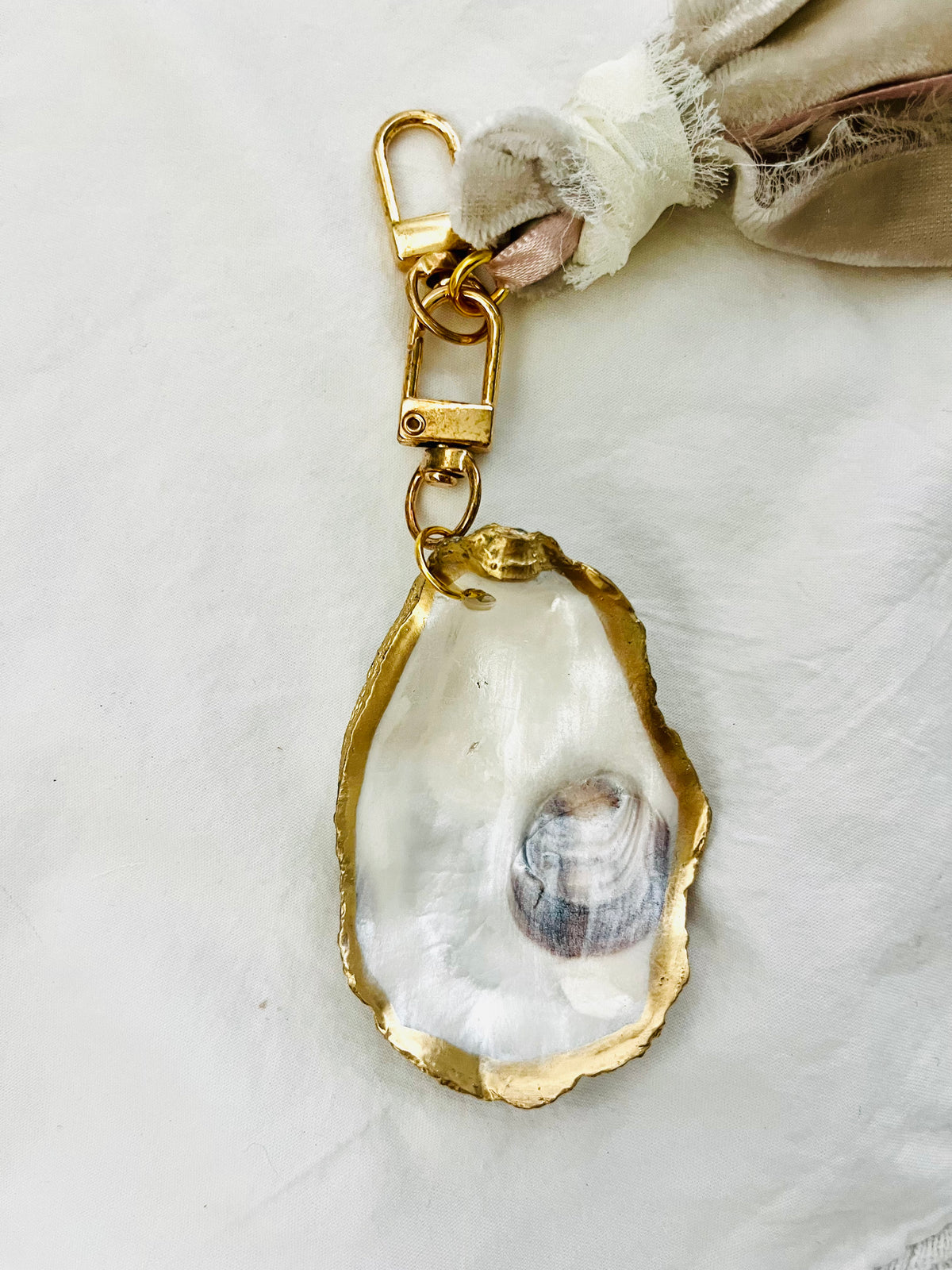 Soft and romantic velvet ribbon and pearls oyster shell bag charm