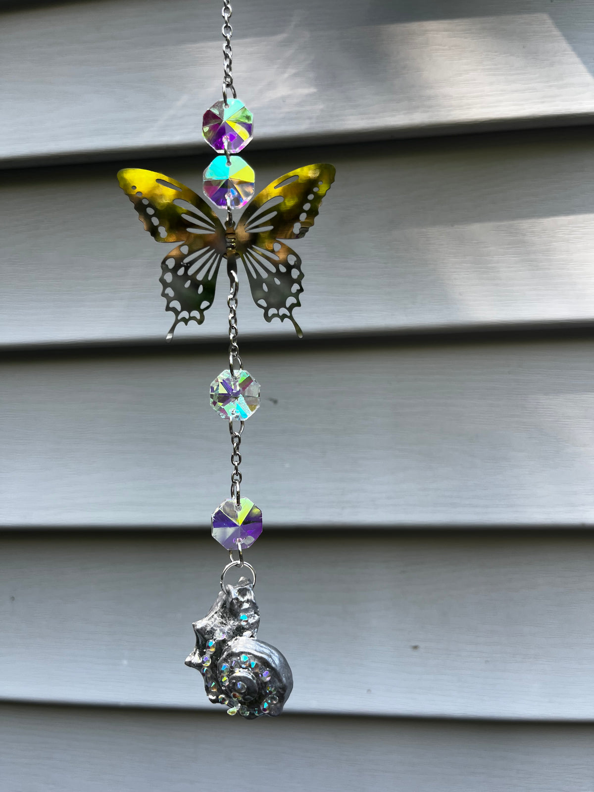 Handmade butterfly and seashell suncatcher