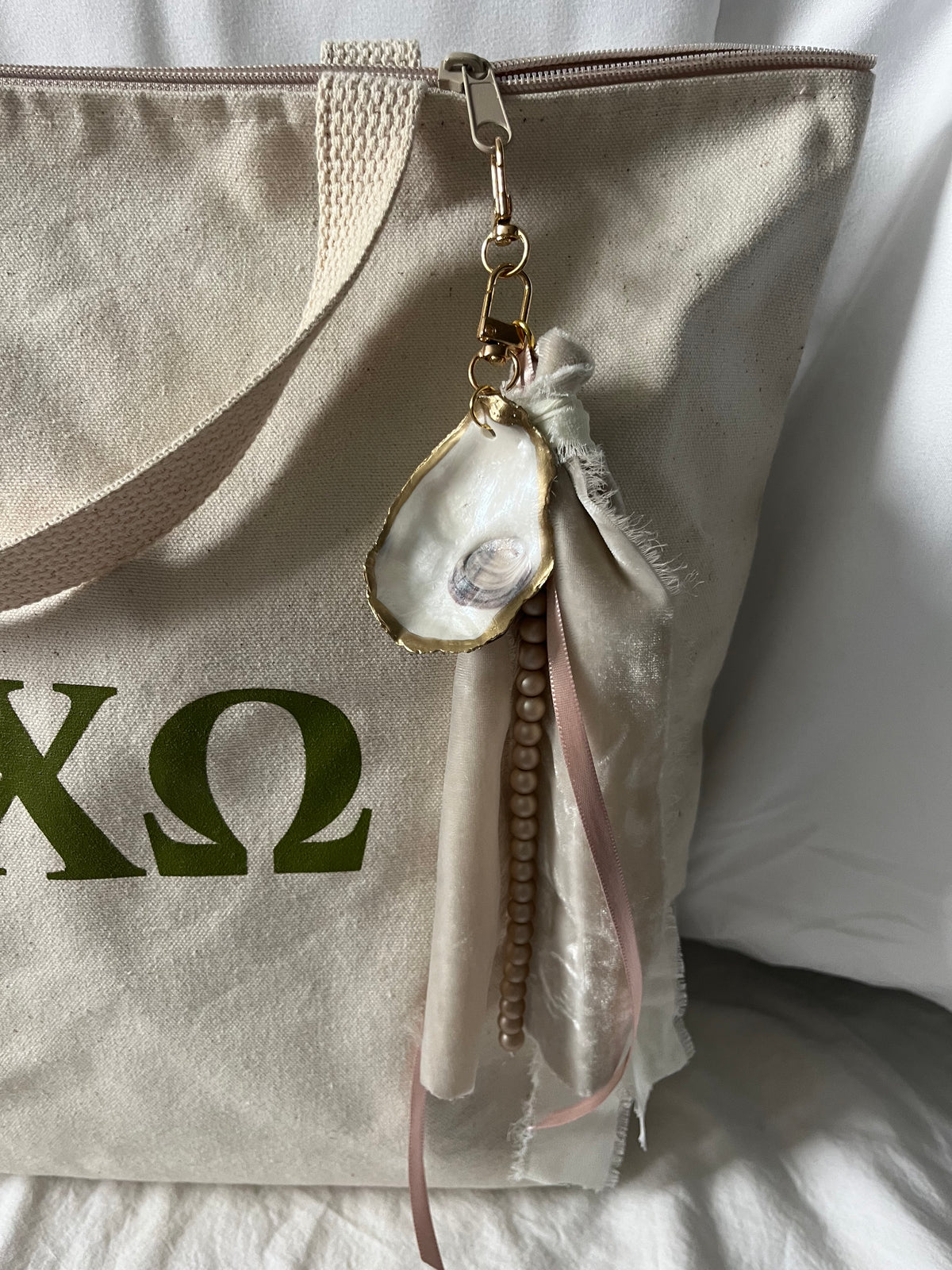 Soft and romantic velvet ribbon and pearls oyster shell bag charm
